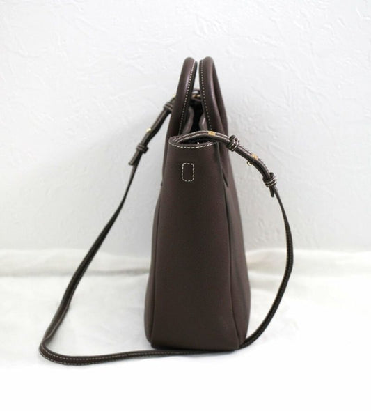 Shoulder bag "Pelm" detail.Color:Brown