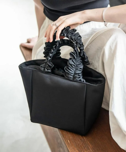 Frill handle tote bag “lifuka nylon S” Color: Black