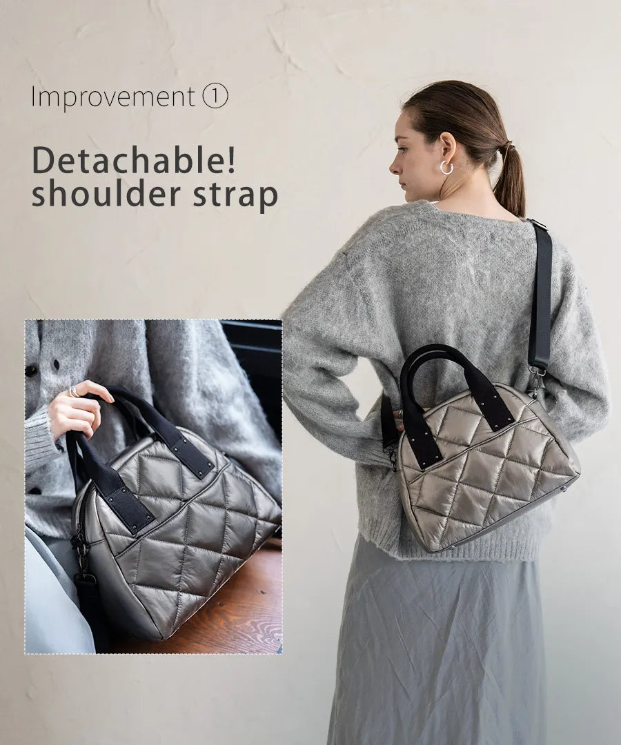 A female model is carrying a tote bag "Peremo (Version 2)" over her shoulder.Color:Champagne silver